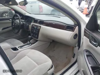 2014 Chevrolet Impala Limited LS with VIN 2G1WA5E35E1158295, listed as a IAAI auction lot 41951510 with NaN miles. Bid and sale history available at carsss.com. Image 5.