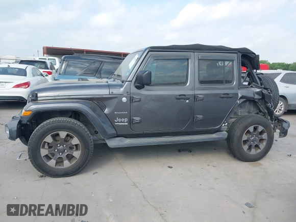 2018 Jeep Wrangler Unlimited Sahara z VIN 1C4HJXEG5JW194523, wystawiony jako IAAI lot #42056557 z przebiegiem 71 141 mil mil oraz . Historia ofert i sprzedaży dostępna na DreamBid. Obrazek 14.
