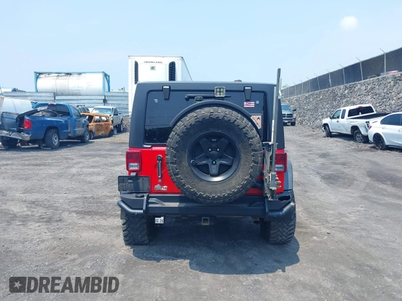 2014 Jeep Wrangler Unlimited Rubicon with VIN 1C4BJWFG0EL326979, listed as a IAAI auction lot 41913129 with 118,548 mi miles and . Bid and sale history available at DreamBid. Image 17.