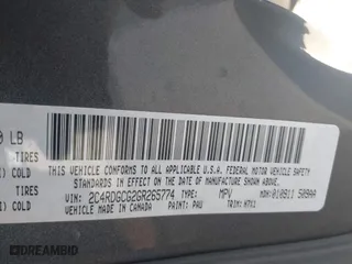 2016 Dodge Grand Caravan SXT with VIN 2C4RDGCG2GR265774, listed as a IAAI auction lot 41763444 with 142,700 mi miles. Bid and sale history available at carsss.com. Image 8.