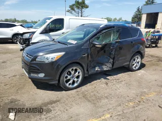 2015 Ford Escape Titanium z VIN 1FMCU9J95FUA41093, wystawiony jako Copart lot #65874175 z przebiegiem 198 863 mil mil oraz Czysty tytuł • Clean title. Historia ofert i sprzedaży dostępna na DreamBid. Obrazek 1.