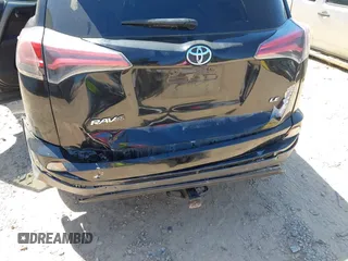2016 Toyota RAV4 LE with VIN 2T3ZFREV1GW274702, listed as a IAAI auction lot 42058167 with 150,080 mi miles. Bid and sale history available at carsss.com. Image 6.