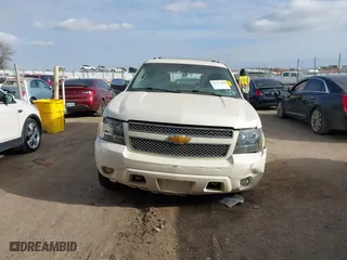2012 Chevrolet Suburban LTZ with VIN 1GNSKKE71CR251475, listed as a IAAI auction lot 41276204 with 241,316 mi miles. Bid and sale history available at carsss.com. Image 12.