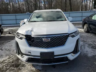 2022 Cadillac XT6 Premium Luxury with VIN 1GYKPCRS4NZ128684, listed as a Copart auction lot 87806525 with 23,571 mi miles and Salvage Title. Bid and sale history available at carsss.com. Image 5.