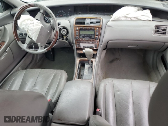 2003 Toyota Avalon XL z VIN 4T1BF28B03U326172, wystawiony jako Copart lot #44729485 z przebiegiem Nie podano mil oraz Nie do naprawy • Non repairable. Historia ofert i sprzedaży dostępna na DreamBid. Obrazek 8.