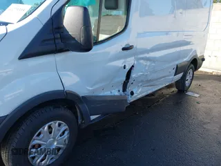 2018 Ford Transit with VIN 1FTBW2CG8JKB46535, listed as a IAAI auction lot 41279395 with 82,301 mi miles and . Bid and sale history available at DreamBid. Image 6.
