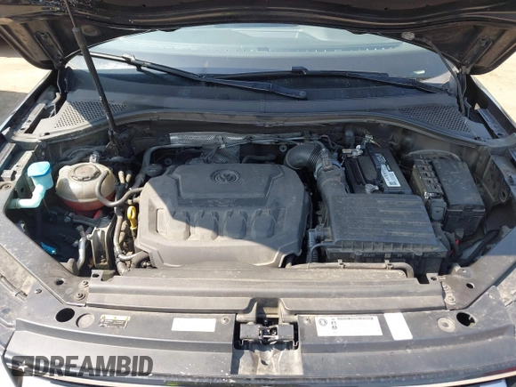 2018 Volkswagen Tiguan S with VIN 3VV1B7AX7JM092033, listed as a IAAI auction lot 42373619 with 124,775 mi miles and . Bid and sale history available at DreamBid. Image 10.