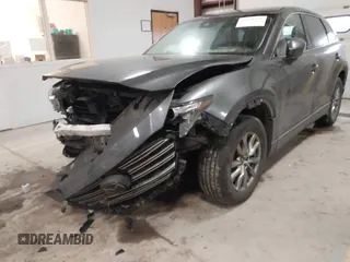 2019 Mazda CX-9 Touring with VIN JM3TCBCY3K0305147, listed as a IAAI auction lot 41676425 with 104,265 mi miles and . Bid and sale history available at carsss.com. Image 6.
