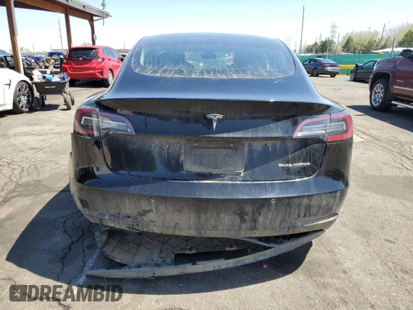 2019 Tesla Model 3 Long Range with VIN 5YJ3E1EB8KF451535, listed as a Copart auction lot 53085105 with 133,928 mi miles and Non Repairable. Bid and sale history available at DreamBid. Image 6.