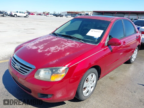 2009 Kia Spectra EX with VIN KNAFE221195606045, listed as a IAAI auction lot 41764519 with 124,577 mi miles. Bid and sale history available at carsss.com. Image 2.