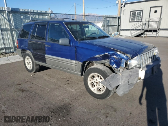 1997 Jeep Grand Cherokee Limited with VIN 1J4GZ78Y8VC737860, listed as a Copart auction lot 72981354 with 292,652 mi miles and Salvage Title. Bid and sale history available at carsss.com. Image 4.
