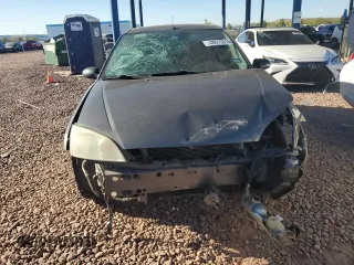 2005 Ford Focus S with VIN 3FAFP31NX5R154035, listed as a Copart auction lot 48015915 with Not Provided miles and Salvage Title. Bid and sale history available at carsss.com. Image 5.