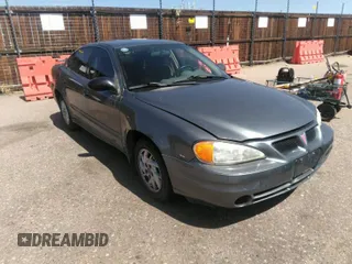 2004 Pontiac Grand Am SE1 with VIN 1G2NF52E74M507328, listed as a IAAI auction lot 42012666 with 157,263 mi miles. Bid and sale history available at carsss.com. Image 1.