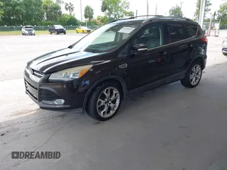 2013 Ford Escape Titanium z VIN 1FMCU0J95DUD22433, wystawiony jako IAAI lot #42495946 z przebiegiem 219 449 mil mil oraz . Historia ofert i sprzedaży dostępna na DreamBid. Obrazek 2.