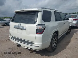 2014 Toyota 4Runner SR5 with VIN JTEZU5JR7E5080554, listed as a IAAI auction lot 42134833 with 170,077 mi miles and . Bid and sale history available at DreamBid. Image 4.