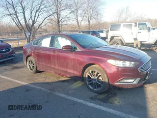 2018 Ford Fusion SE z VIN 3FA6P0H95JR152937, wystawiony jako IAAI lot #41306379 z przebiegiem 110 546 mil mil oraz . Historia ofert i sprzedaży dostępna na DreamBid. Obrazek 1.