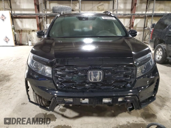 2023 Honda Passport Elite with VIN 5FNYF8H03PB017374, listed as a Copart auction lot 86383224 with 2,046 mi miles and Salvage Title. Bid and sale history available at carsss.com. Image 5.
