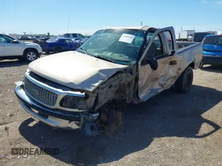 1998 Ford F-150 with VIN 1FTZF1726WKC16774, listed as a IAAI auction lot 41646280 with 142,100 mi miles and . Bid and sale history available at DreamBid. Image 2.