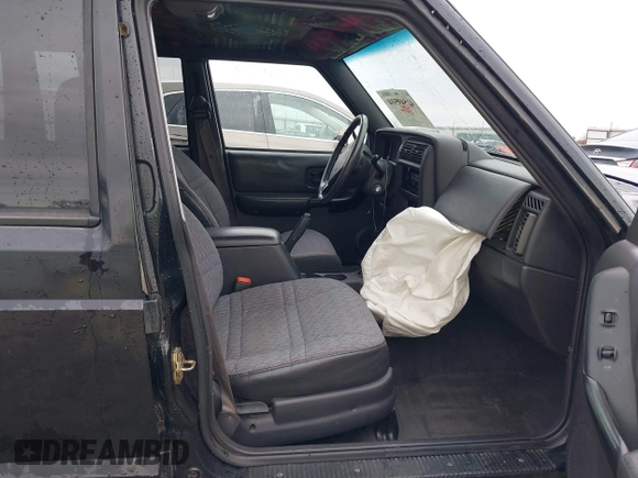 1999 Jeep Cherokee Sport with VIN 1J4FT68S6XL598558, listed as a IAAI auction lot 41549504 with 238,004 mi miles. Bid and sale history available at carsss.com. Image 5.