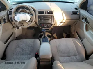 2005 Ford Focus S with VIN 1FAFP34N65W240449, listed as a Copart auction lot 52457395 with 140,246 mi miles and Non Repairable. Bid and sale history available at DreamBid. Image 8.