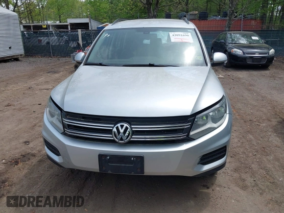 2016 Volkswagen Tiguan S with VIN WVGBV7AX1GW523335, listed as a IAAI auction lot 42091690 with 165,495 mi miles and . Bid and sale history available at DreamBid. Image 12.