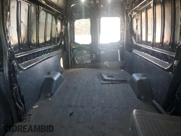 2019 Ford Transit with VIN 1FTBW3XM9KKA29912, listed as a Copart auction lot 83702114 with 99,090 mi miles and Clean title. Bid and sale history available at DreamBid. Image 10.