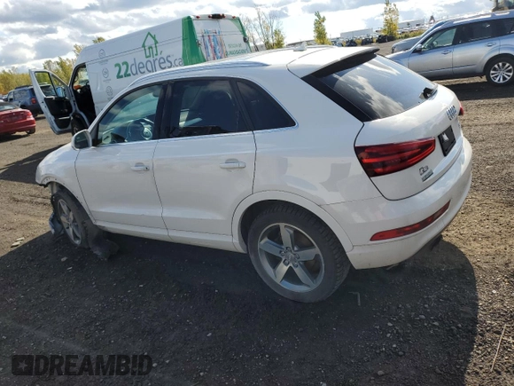 2015 Audi Q3 with VIN WA1EFEFS5FR009981, listed as a Copart auction lot 73714854 with 157,693 mi miles and Salvage title. Bid and sale history available at DreamBid. Image 2.