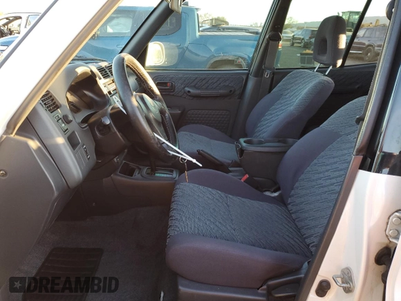 1999 Toyota RAV4 with VIN JT3GP10VXX7053225, listed as a Copart auction lot 87920975 with 228,943 mi miles and Salvage Title. Bid and sale history available at DreamBid. Image 7.