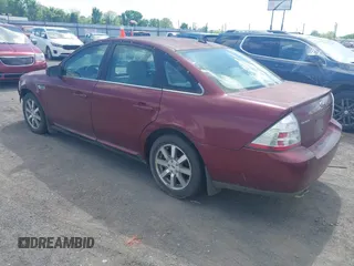 2008 Ford Taurus SEL z VIN 1FAHP24W68G132701, wystawiony jako IAAI lot #41928871 z przebiegiem 385 163 mil mil oraz . Historia ofert i sprzedaży dostępna na DreamBid. Obrazek 3.