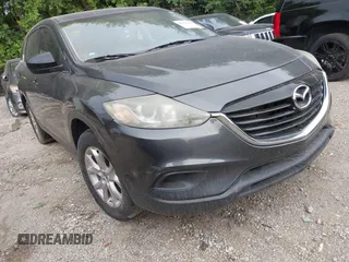 2015 Mazda CX-9 Touring with VIN JM3TB2CA5F0452775, listed as a IAAI auction lot 42659258 with 129,948 mi miles and . Bid and sale history available at DreamBid. Image 1.