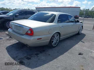 2009 Jaguar XJ with VIN SAJWA94C49TH30042, listed as a IAAI auction lot 41898085 with 145,832 mi miles and . Bid and sale history available at DreamBid. Image 4.
