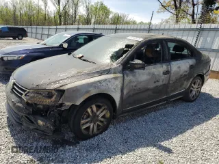 2017 Volkswagen Jetta SEL z VIN 3VWL17AJ6HM203636, wystawiony jako Copart lot #56059865 z przebiegiem Nie podano mil oraz Szkoda całkowita • Salvage title. Historia ofert i sprzedaży dostępna na DreamBid. Obrazek 1.