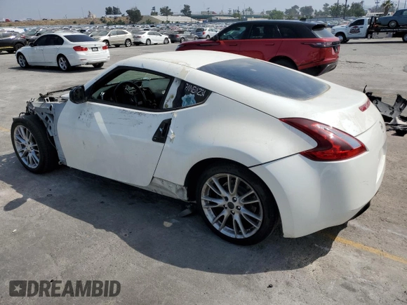 2013 Nissan 370Z with VIN JN1AZ4EH9DM381266, listed as a Copart auction lot 59989515 with 170,900 mi miles and Salvage title. Bid and sale history available at DreamBid. Image 2.