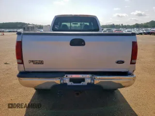 1999 Ford F-350 XL with VIN 1FTSW31S2XEE89071, listed as a Copart auction lot 61016685 with 115,130 mi miles and Salvage title. Bid and sale history available at DreamBid. Image 6.