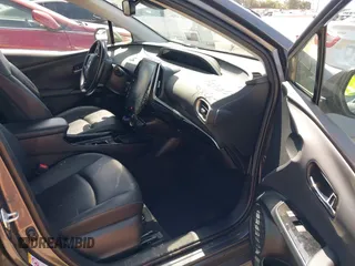 2021 Toyota Prius LE with VIN JTDKAMFP3M3167586, listed as a IAAI auction lot 39672661 with 42,050 mi miles and . Bid and sale history available at DreamBid. Image 5.