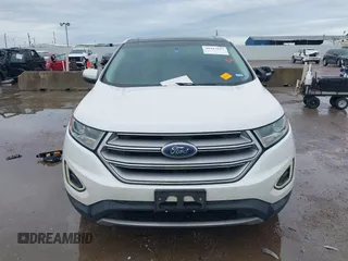 2015 Ford Edge Titanium z VIN 2FMTK3K82FBC42299, wystawiony jako IAAI lot #41912657 z przebiegiem 198 144 mil mil oraz . Historia ofert i sprzedaży dostępna na DreamBid. Obrazek 12.