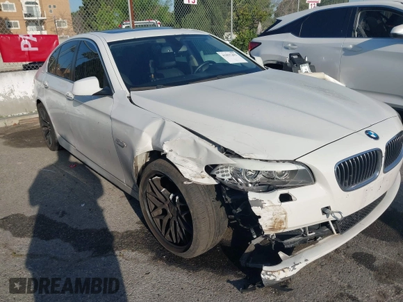 2013 BMW 5 Series 528i with VIN WBAXG5C55DD233592, listed as a IAAI auction lot 41827491 with 113,342 mi miles and . Bid and sale history available at carsss.com. Image 6.