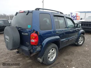 2004 Jeep Liberty Limited with VIN 1J4GL58K34W112569, listed as a IAAI auction lot 42021937 with 181,814 mi miles. Bid and sale history available at carsss.com. Image 4.
