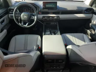 2024 Honda Pilot EX-L 8 Passenger with VIN 5FNYG1H45RB005687, listed as a Copart auction lot 73802974 with 23,774 mi miles and Salvage Title. Bid and sale history available at carsss.com. Image 8.