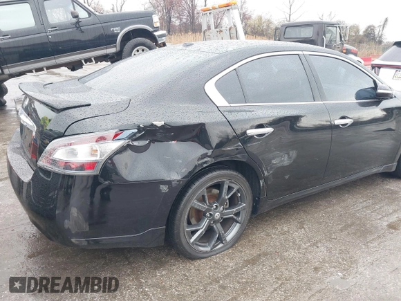 2014 Nissan Maxima SV with VIN 1N4AA5AP6EC437992, listed as a IAAI auction lot 41856233 with 69,059 mi miles and . Bid and sale history available at DreamBid. Image 6.
