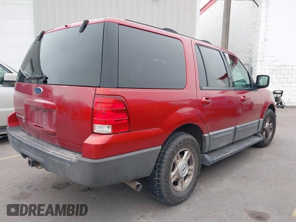 2004 Ford Expedition XLT with VIN 1FMPU16W54LB57799, listed as a IAAI auction lot 41538969 with 289,424 mi miles. Bid and sale history available at carsss.com. Image 4.