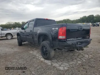 2012 GMC Sierra 2500HD SLT with VIN 1GT121E89CF142433, listed as a Copart auction lot 71720594 with 171,967 mi miles and Salvage title. Bid and sale history available at DreamBid. Image 2.