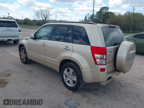 2008 Suzuki Grand Vitara Luxury z VIN JS3TD947384100130, wystawiony jako IAAI lot #41713955 z przebiegiem 180 631 mil mil oraz . Historia ofert i sprzedaży dostępna na DreamBid. Obrazek 3.