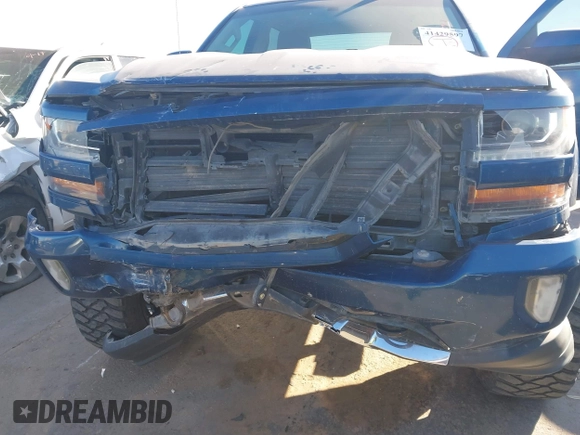 2017 Chevrolet Silverado 1500 LT with VIN 3GCUKREC8HG354004, listed as a IAAI auction lot 41429597 with 77,493 mi miles and . Bid and sale history available at DreamBid. Image 6.