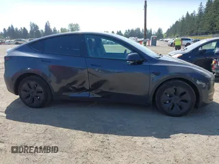 2024 Tesla Model Y Long Range with VIN 7SAYGDEE3RF177458, listed as a IAAI auction lot 42109641 with 7,890 mi miles. Bid and sale history available at carsss.com. Image 13.
