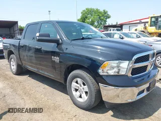 2023 Ram 1500 SLT with VIN 1C6RR6LG0PS518740, listed as a IAAI auction lot 42399168 with 51,999 mi miles and . Bid and sale history available at DreamBid. Image 1.