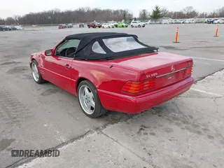 1997 Mercedes-Benz SL-Class with VIN WDBFA67F2VF142244, listed as a IAAI auction lot 41823242 with Not Provided miles. Bid and sale history available at carsss.com. Image 3.