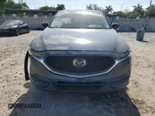 2021 Mazda CX-5 Grand Touring with VIN JM3KFBDM4M1462570, listed as a Copart auction lot 54827675 with 45,389 mi miles and Salvage Title. Bid and sale history available at DreamBid. Image 5.