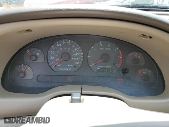 2002 Ford Mustang Deluxe z VIN 1FAFP44472F107630, wystawiony jako Copart lot #56256865 z przebiegiem 214 457 mil mil oraz Szkoda całkowita • Salvage title. Historia ofert i sprzedaży dostępna na DreamBid. Obrazek 9.