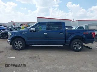 2015 Ford F-150 XLT z VIN 1FTEW1EF6FKD56067, wystawiony jako IAAI lot #41883119 z przebiegiem 232 405 mil mil oraz . Historia ofert i sprzedaży dostępna na DreamBid. Obrazek 14.